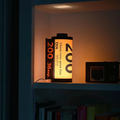 Vintage Film Canister Table Lamp with Warm Golden Glow