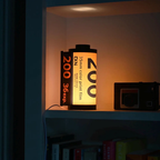 Vintage Film Canister Table Lamp with Warm Golden Glow
