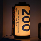 Vintage Film Canister Table Lamp with Warm Golden Glow