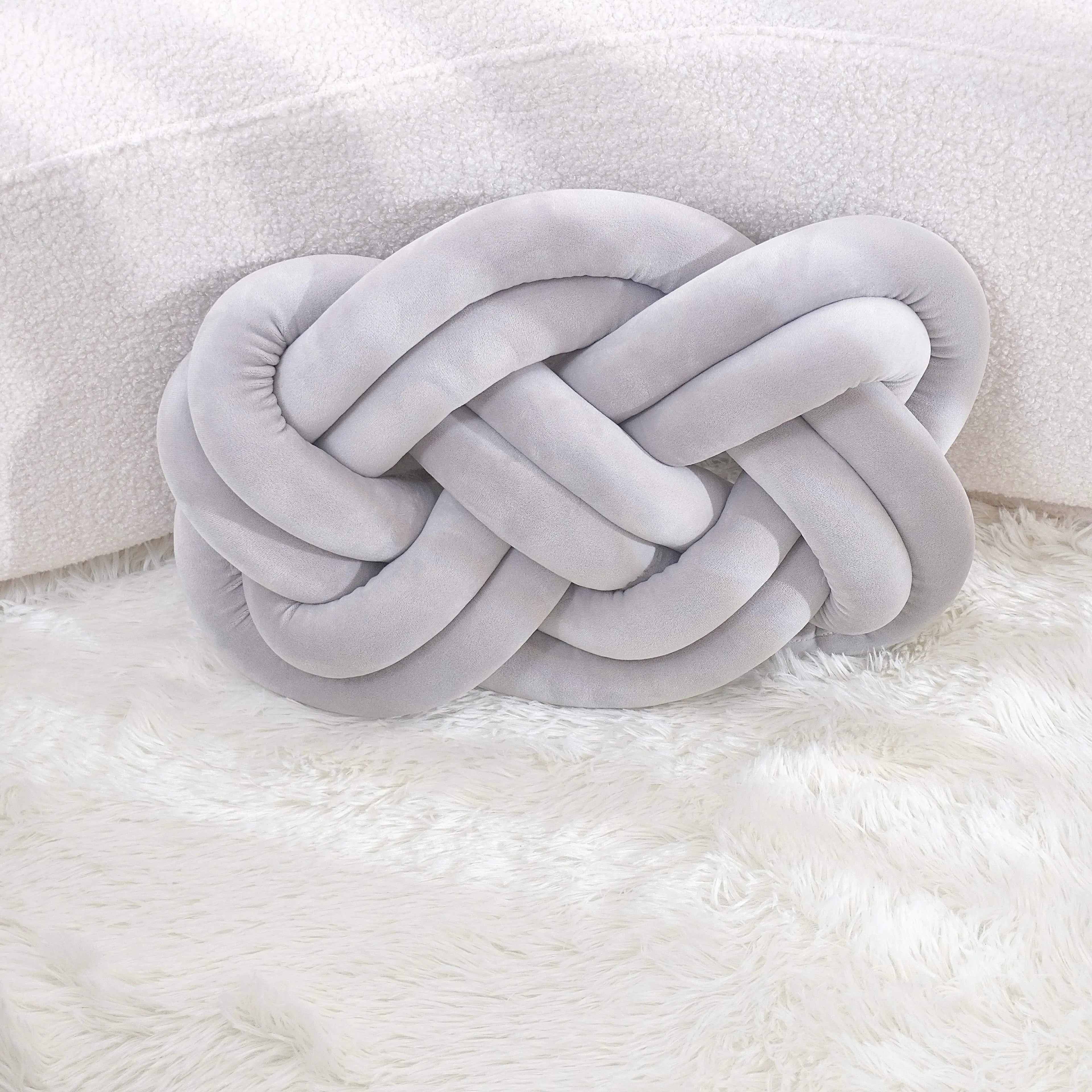 Knotted Velvet Throw Pillow – Modern Geometric Design