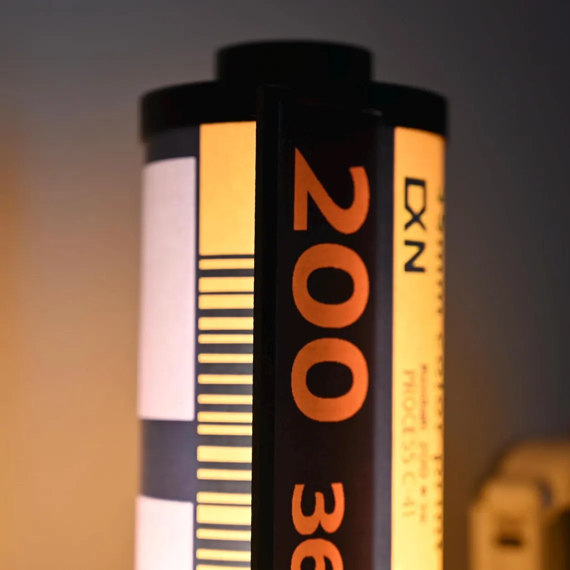 Vintage Film Canister Table Lamp with Warm Golden Glow